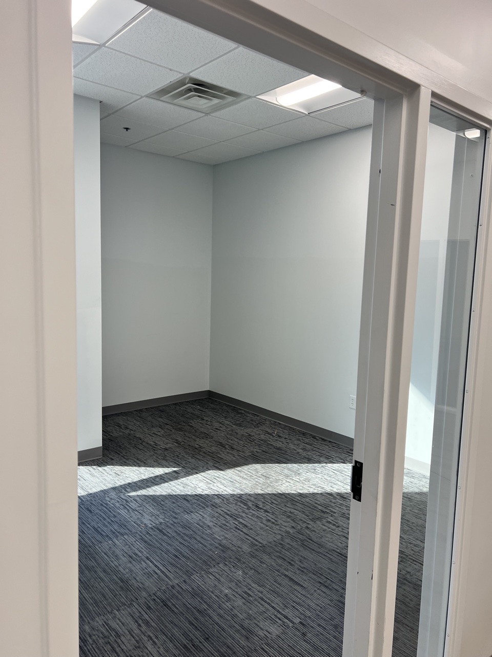 Private office with new paint and carpet